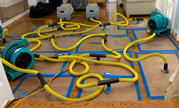 Professional Storm Water Damage Restoration technician working in Kansas, OK
